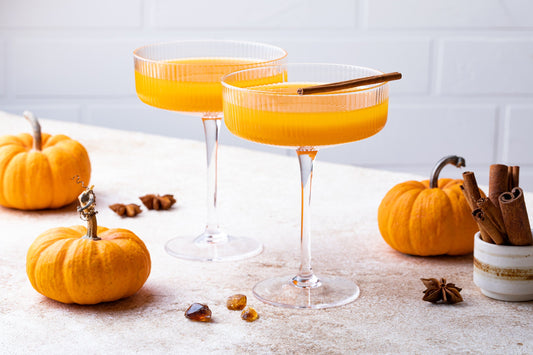 Halloween, Thanksgiving or fall cocktail pumpkin martini, homemade festive seasonal drink pumpkintini with cinnamon